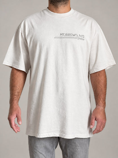 Hebrews 4:12 tee in Faded Bone, front view on a male model, katana and Hebrews 4:12 print on the chest