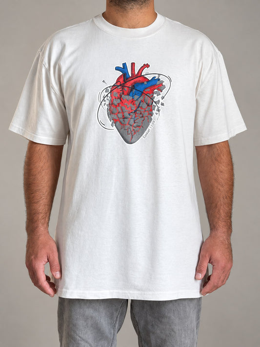 Ezekiel 11:19 tee in Faded Bone, front view on a male model, anatomical heart print