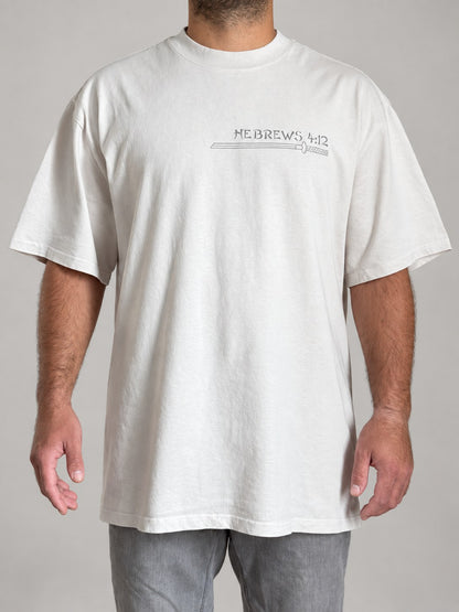 Hebrews 4:12 tee in Faded Bone, front view of the boxy oversized fit on a male model
