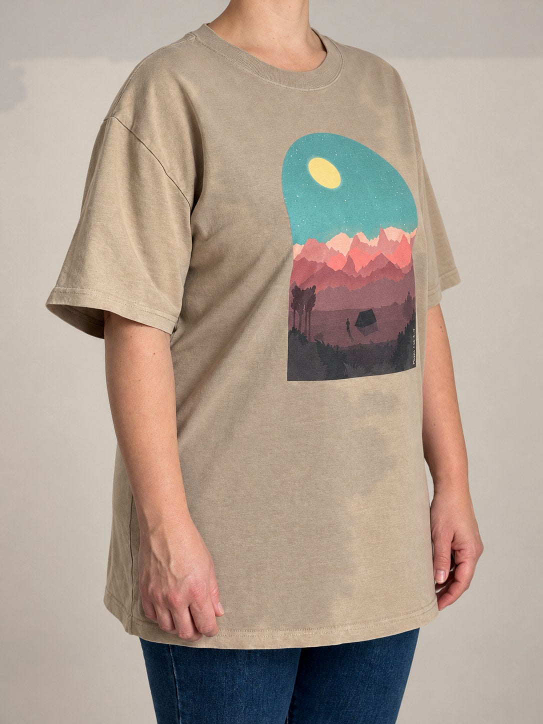 Psalm 121:1-2 tee in Faded Khaki, three-quarter view on a female model showing the boxy oversized fit