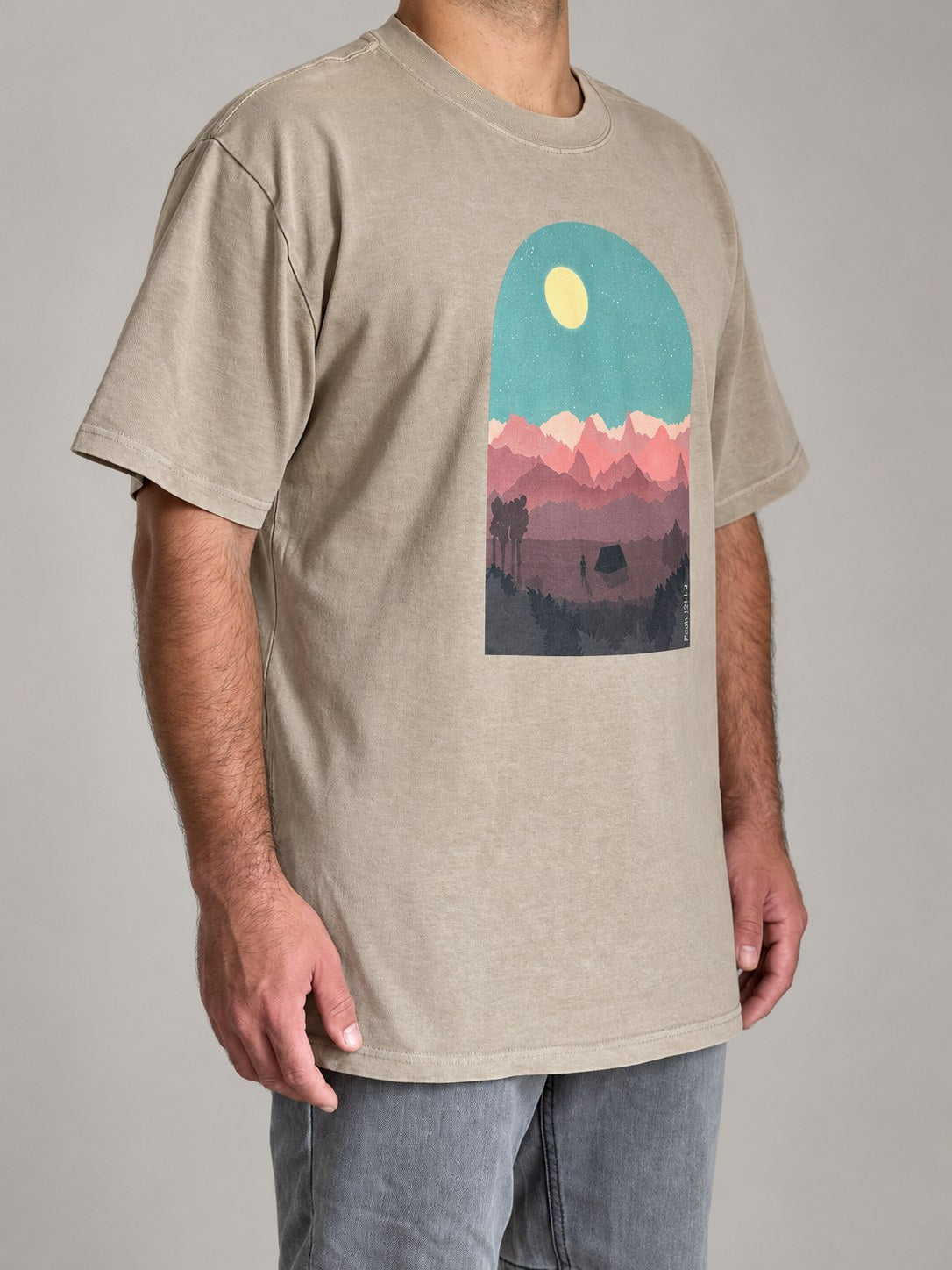Psalm 121:1-2 tee in Faded Khaki, three-quarter view on a male model showing the boxy oversized fit