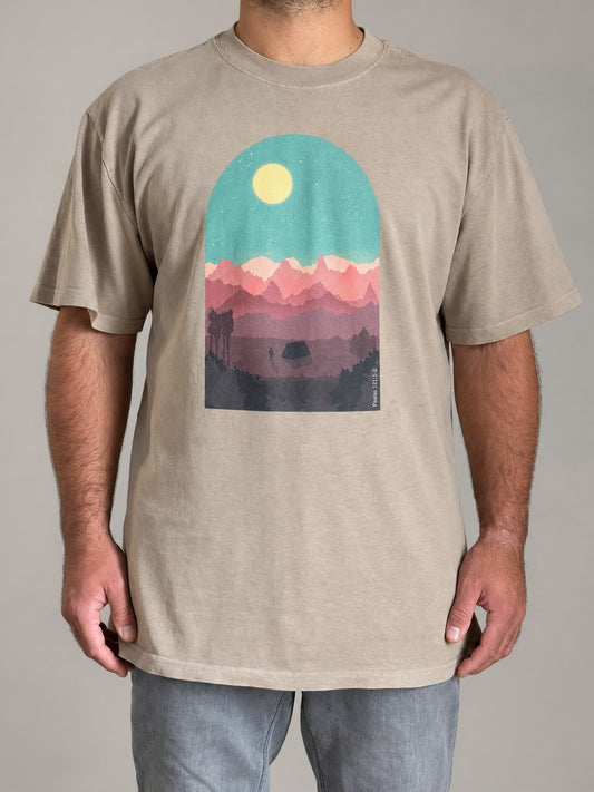 Psalm 121:1-2 oversized faded tee in Faded Khaki, front view on a male model, moonlit mountain scene print